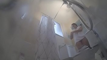 Play Natalia gets caught soaping her BIG TITS in the shower
